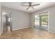 Neutral bedroom with tile floors and sliding glass door leading to backyard at 4303 N 18Th St, Phoenix, AZ 85016