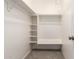 Organized closet with shelves and clothing racks, offering ample storage space at 4303 N 18Th St, Phoenix, AZ 85016