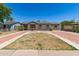 Charming single-story home with a well-manicured yard and a spacious driveway at 4303 N 18Th St, Phoenix, AZ 85016
