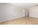 Open-concept living room featuring neutral paint and tile floors, perfect for entertaining at 4303 N 18Th St, Phoenix, AZ 85016