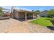 Well-maintained backyard with a covered patio and gravel, perfect for relaxing or entertaining at 5319 E Gelding Dr, Scottsdale, AZ 85254