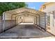 Carport and garage offering ample covered parking and storage, enhancing convenience and security at 5319 E Gelding Dr, Scottsdale, AZ 85254