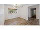 Bright room with chandelier, hardwood floors and window at 5319 E Gelding Dr, Scottsdale, AZ 85254