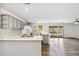Bright open kitchen with gray cabinets and countertops, complemented by sliding glass doors to the backyard at 5319 E Gelding Dr, Scottsdale, AZ 85254