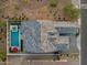 Aerial view showcases the home's roof, backyard pool, and outdoor living space at 5901 E Sierra Morena St, Mesa, AZ 85215