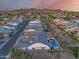 Aerial view of home with a pool and desert landscaping, near community street at 5901 E Sierra Morena St, Mesa, AZ 85215