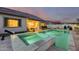 Outdoor oasis featuring a private pool, spa, patio area, and lounge seating, perfect for entertaining at 5901 E Sierra Morena St, Mesa, AZ 85215