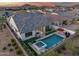 Backyard oasis with pool and spa, patio furniture and view of main house at 5901 E Sierra Morena St, Mesa, AZ 85215