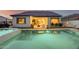 Attractive backyard with a pool, spa, seamless indoor-outdoor living, and beautifully landscaped grounds at 5901 E Sierra Morena St, Mesa, AZ 85215