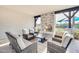 Outdoor lounge area featuring comfortable seating and an inviting fireplace at 5901 E Sierra Morena St, Mesa, AZ 85215