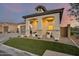 Stunning home featuring stucco siding, gray accents, and beautifully landscaped front yard at 5901 E Sierra Morena St, Mesa, AZ 85215