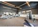 Spacious community gym with state-of-the-art equipment and ample natural light at 5901 E Sierra Morena St, Mesa, AZ 85215