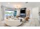 Inviting living room features a fireplace, sleek lighting, and large sliding doors at 5901 E Sierra Morena St, Mesa, AZ 85215