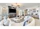 Beautiful living area with fireplace, elegant furniture, and neutral decor at 5901 E Sierra Morena St, Mesa, AZ 85215
