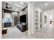 Formal living room with trey ceiling, TV and custom cabinets at 5901 E Sierra Morena St, Mesa, AZ 85215