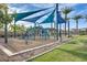 Community playground with modern equipment, shaded areas, and well-maintained landscaping at 5901 E Sierra Morena St, Mesa, AZ 85215
