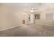 Spacious main bedroom features neutral walls, carpet flooring and walk-in bathroom and closet at 7002 E Exmoor Dr, Mesa, AZ 85208