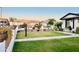 Well-maintained front yard with manicured lawn, decorative landscaping and charming curb appeal at 7943 W Mariposa Dr, Phoenix, AZ 85033
