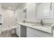 Beautiful bathroom features a dual sink vanity, granite counters, and a tiled walk-in shower at 819 N Robson --, Mesa, AZ 85201