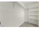 Walk-in closet featuring wood-look flooring and built-in shelving for storage and organization at 819 N Robson --, Mesa, AZ 85201