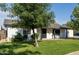 Cozy single-story home with a well-manicured lawn and appealing curb appeal at 819 N Robson --, Mesa, AZ 85201