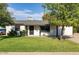 Charming single-story home with a well-maintained lawn, offering an attractive curb appeal at 819 N Robson --, Mesa, AZ 85201