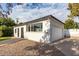 Spacious detached garage with a two-car door, adjacent to a well-manicured lawn, offering convenience and functionality at 819 N Robson --, Mesa, AZ 85201