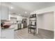 Lovely kitchen features stainless steel appliances, white cabinets and tile flooring at 819 N Robson --, Mesa, AZ 85201