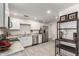 Bright kitchen features stainless steel appliances, granite countertops, and tile flooring at 819 N Robson --, Mesa, AZ 85201