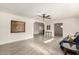 Inviting living room featuring hardwood-style floors, bright walls and a contemporary ceiling fan at 819 N Robson --, Mesa, AZ 85201