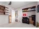 A bedroom featuring a closet with boxes and bags on the shelves at 8306 E Via De Dorado --, Scottsdale, AZ 85258