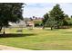 Scenic community park featuring lush green grass, walking paths, trees and shaded picnic areas and basketball hoops at 8306 E Via De Dorado --, Scottsdale, AZ 85258
