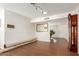 Bright entryway with a view through to the front doors and beautiful, gleaming wood floors at 8306 E Via De Dorado --, Scottsdale, AZ 85258