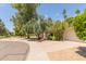 Landscaped single-story home featuring desert landscaping, and mature trees at 8306 E Via De Dorado --, Scottsdale, AZ 85258