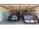 A well-organized garage showcasing two black sports cars parked inside at 8306 E Via De Dorado --, Scottsdale, AZ 85258