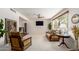 Bright living room features a ceiling fan, large windows, and comfortable seating at 8306 E Via De Dorado --, Scottsdale, AZ 85258