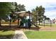 Well-maintained playground with colorful play structures and mature trees, perfect for Gathering fun and outdoor activities at 8306 E Via De Dorado --, Scottsdale, AZ 85258