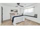 Bright bedroom featuring a window seat and a modern ceiling fan at 8316 E Glenrosa Ave, Scottsdale, AZ 85251