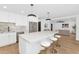 Modern kitchen with stainless steel appliances and large island with seating at 8316 E Glenrosa Ave, Scottsdale, AZ 85251