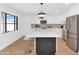 Modern kitchen with stainless steel appliances and large island with seating at 8316 E Glenrosa Ave, Scottsdale, AZ 85251