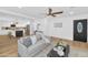 Open-concept living space with hardwood flooring, neutral color palette, and modern finishes at 8316 E Glenrosa Ave, Scottsdale, AZ 85251