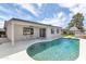 Inviting pool area with a sparkling pool, patio, and well-maintained backyard, perfect for outdoor enjoyment at 8316 E Glenrosa Ave, Scottsdale, AZ 85251