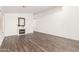 Large living area features modern floors and a decorative fireplace at 8648 W Fargo Dr, Peoria, AZ 85382