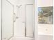 Clean bathroom with walk-in shower, and tub next to a window at 8648 W Fargo Dr, Peoria, AZ 85382