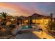 Relaxing backyard pool area with ample space for outdoor entertaining at 1011 E Amberwood Dr, Phoenix, AZ 85048