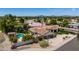 Desert home with a private pool, landscaped yard, tile roof and attached garage at 10205 E Corrine Dr, Scottsdale, AZ 85260