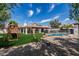 Aerial view of backyard featuring a swimming pool, play structure, and covered patios at 10205 E Corrine Dr, Scottsdale, AZ 85260