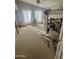 Bedroom area includes windows, mirrors, carpeted floors, and a built-in loft bed at 10205 E Corrine Dr, Scottsdale, AZ 85260