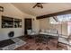 Cozy covered patio featuring tiled floors, comfortable seating, and ample natural light at 10205 E Corrine Dr, Scottsdale, AZ 85260