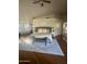 Comfortable main bedroom featuring plush carpet, natural light, and a walk-in closet at 10205 E Corrine Dr, Scottsdale, AZ 85260